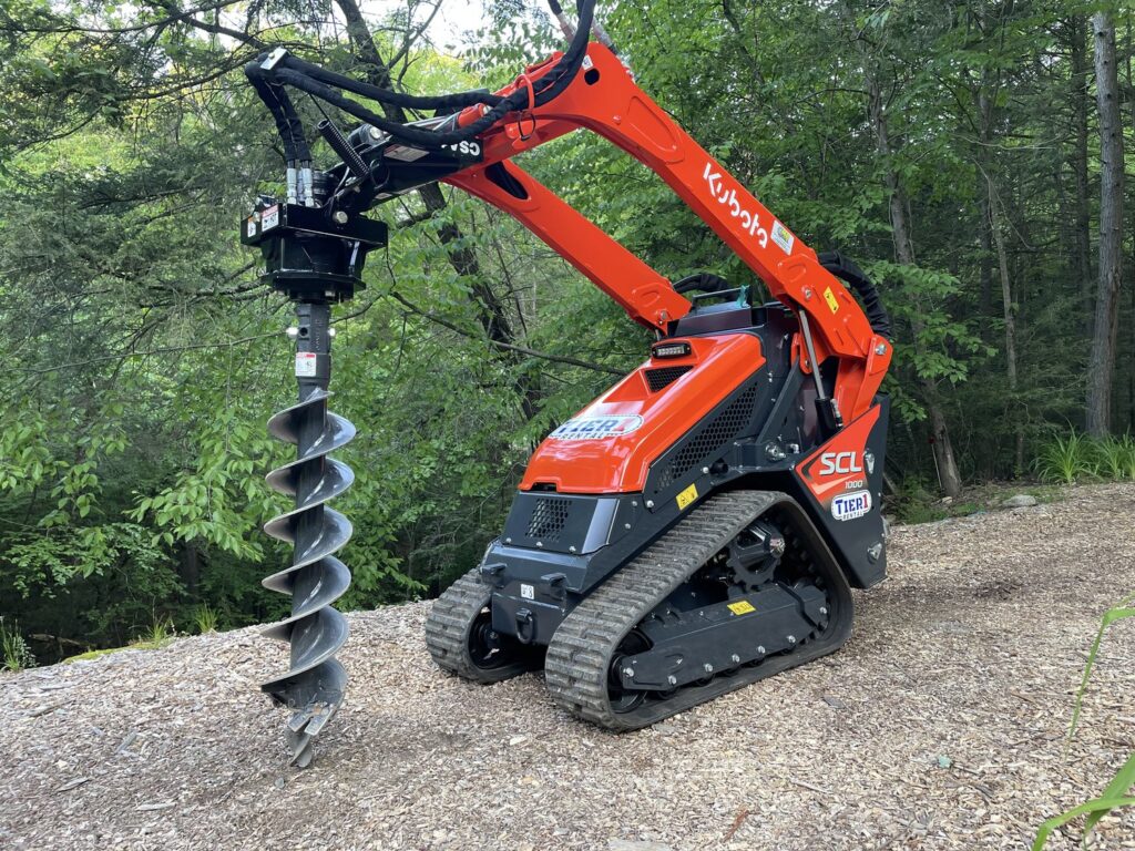 StandOn Mini Skid Steer Rental With Hydraulic Auger at Ward's Rental